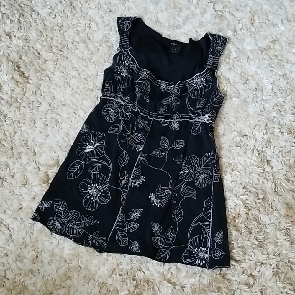 Look cute in this embroidered baby doll top
